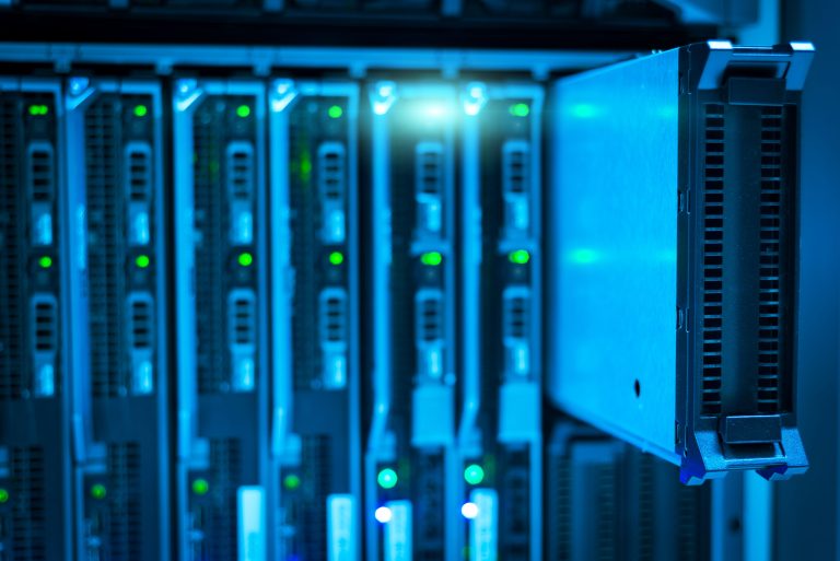 Rows of data center servers represent the infrastructure behind artificial intelligence systems
